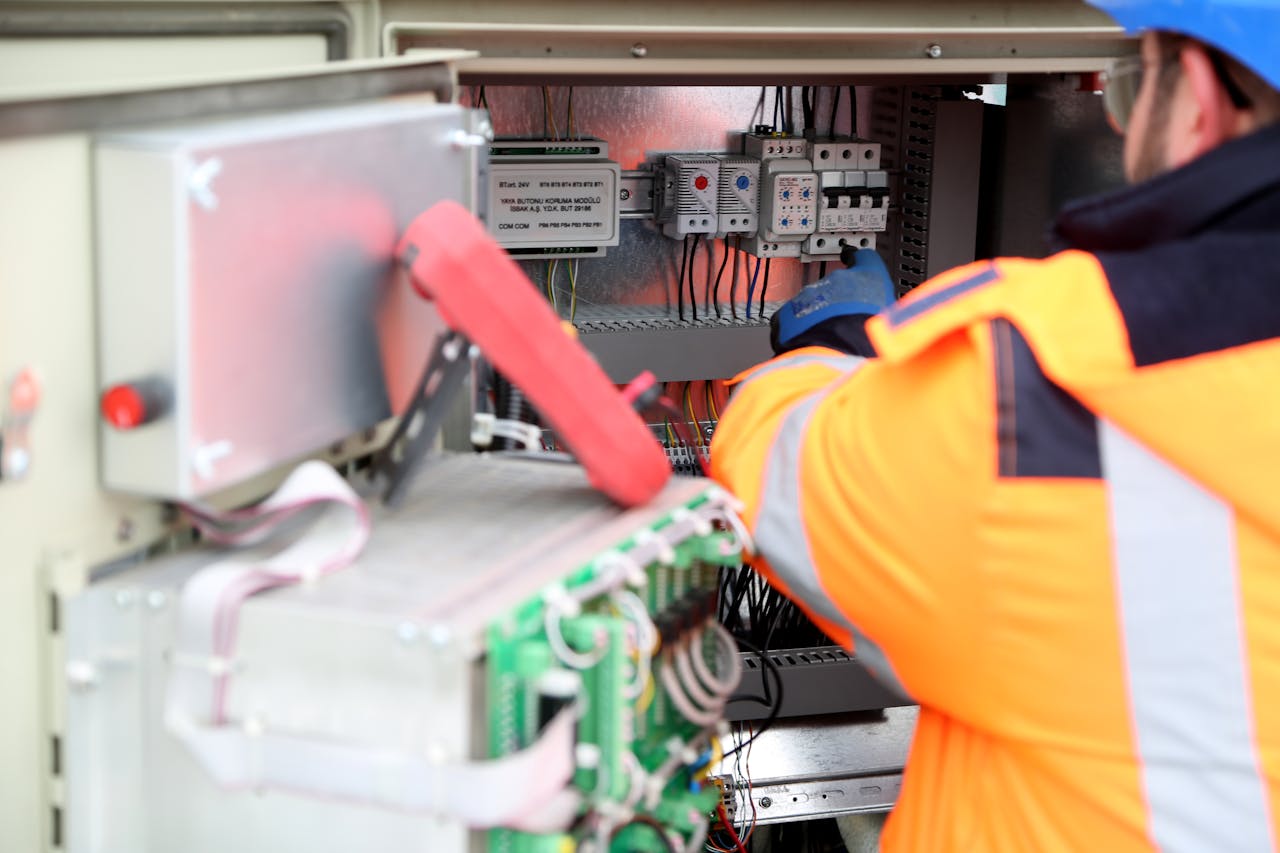 Electrician issuing Certificate of Compliance during property sale inspection